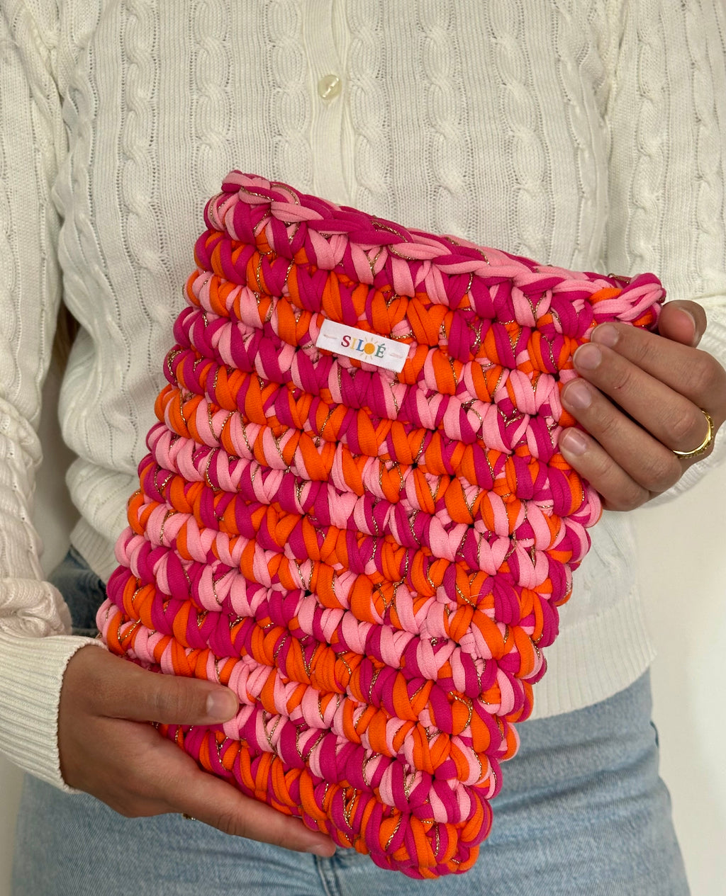 Pochette livre broché orange fushia rose clair et doré